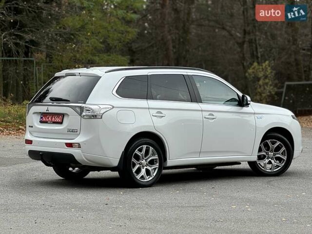 Белый Мицубиси Аутлендер, объемом двигателя 2 л и пробегом 210 тыс. км за 14300 $, фото 31 на Automoto.ua