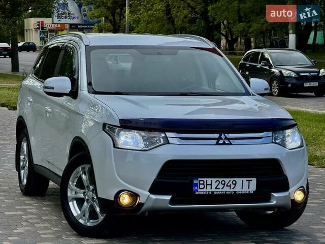 Белый Мицубиси Аутлендер, объемом двигателя 2.4 л и пробегом 140 тыс. км за 12900 $, фото 23 на Automoto.ua