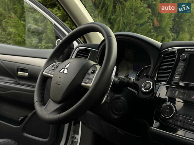 Белый Мицубиси Аутлендер, объемом двигателя 2.3 л и пробегом 214 тыс. км за 15499 $, фото 125 на Automoto.ua