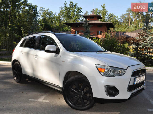 Белый Мицубиси Аутлендер, объемом двигателя 2 л и пробегом 132 тыс. км за 11500 $, фото 2 на Automoto.ua