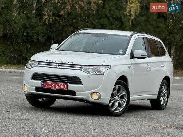 Белый Мицубиси Аутлендер, объемом двигателя 2 л и пробегом 210 тыс. км за 14300 $, фото 15 на Automoto.ua