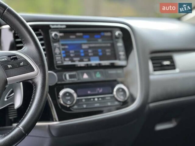 Белый Мицубиси Аутлендер, объемом двигателя 2 л и пробегом 210 тыс. км за 14300 $, фото 53 на Automoto.ua