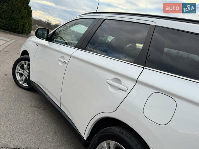 Белый Мицубиси Аутлендер, объемом двигателя 2.3 л и пробегом 214 тыс. км за 15499 $, фото 77 на Automoto.ua