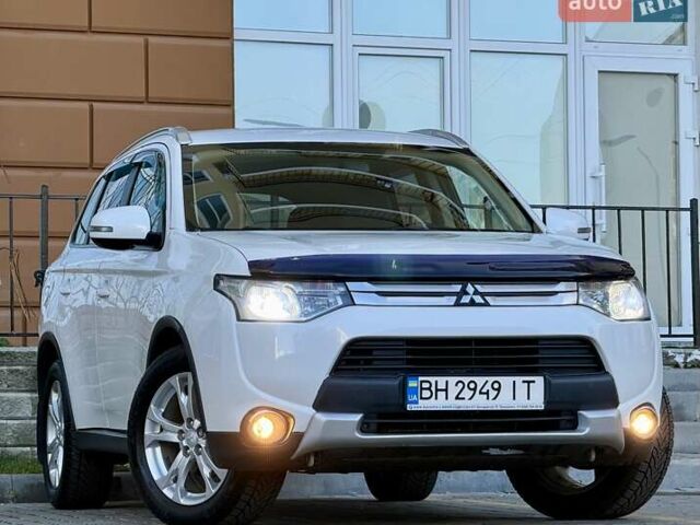 Белый Мицубиси Аутлендер, объемом двигателя 2.36 л и пробегом 140 тыс. км за 12999 $, фото 14 на Automoto.ua