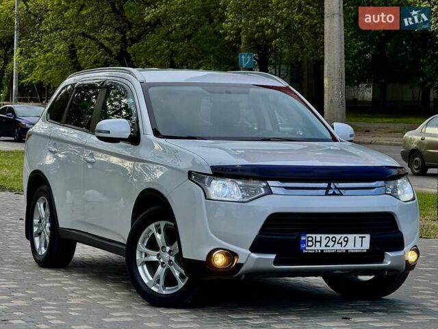 Белый Мицубиси Аутлендер, объемом двигателя 2.4 л и пробегом 140 тыс. км за 12900 $, фото 21 на Automoto.ua