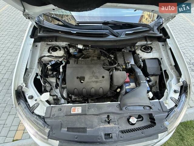 Белый Мицубиси Аутлендер, объемом двигателя 2.36 л и пробегом 140 тыс. км за 12999 $, фото 50 на Automoto.ua