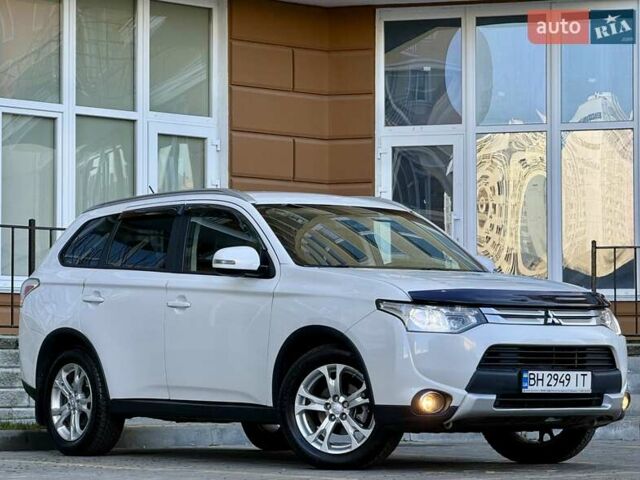 Белый Мицубиси Аутлендер, объемом двигателя 2.36 л и пробегом 140 тыс. км за 12999 $, фото 17 на Automoto.ua