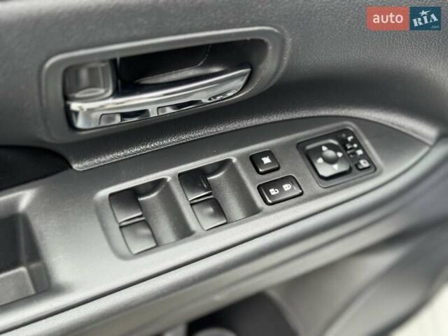 Белый Мицубиси Аутлендер, объемом двигателя 2 л и пробегом 210 тыс. км за 14300 $, фото 55 на Automoto.ua