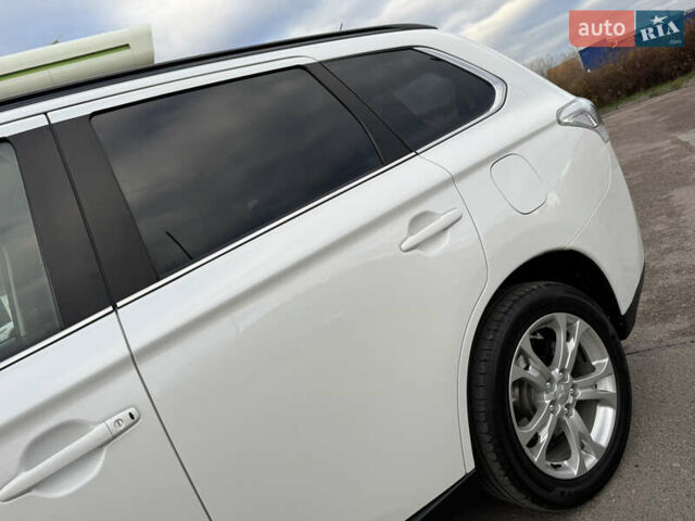 Белый Мицубиси Аутлендер, объемом двигателя 2.3 л и пробегом 214 тыс. км за 15499 $, фото 43 на Automoto.ua
