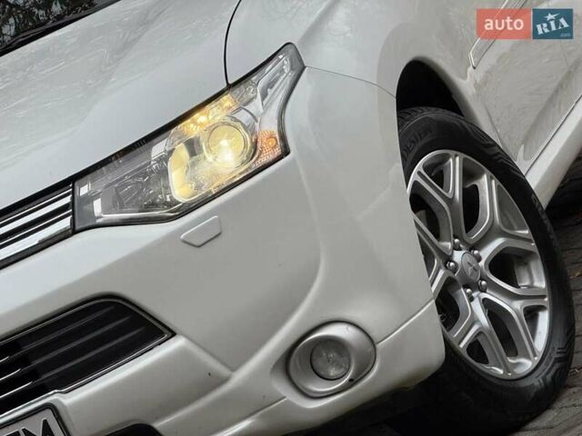 Мицубиси Аутлендер 2014 в Дрогобыче на Automoto.ua Белый Мицубиси Аутлендер, объемом двигателя 2 л и пробегом 228 тыс. км за 15300 $, фото 15 на Automoto.ua