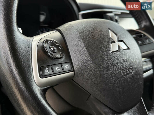 Білий Міцубісі Аутлендер, об'ємом двигуна 2 л та пробігом 222 тис. км за 15800 $, фото 39 на Automoto.ua