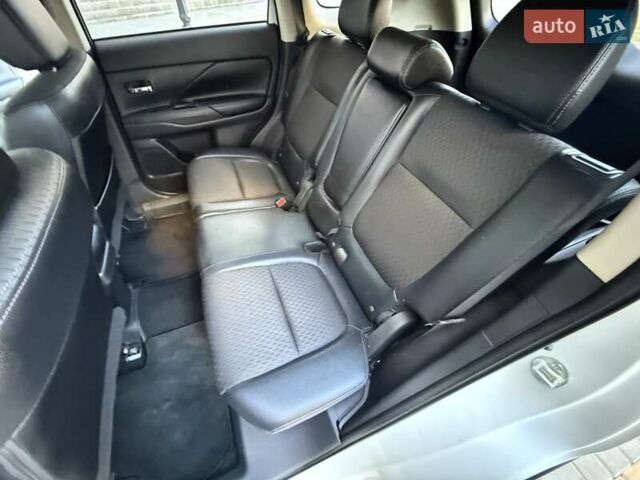 Белый Мицубиси Аутлендер, объемом двигателя 2.36 л и пробегом 140 тыс. км за 12999 $, фото 38 на Automoto.ua