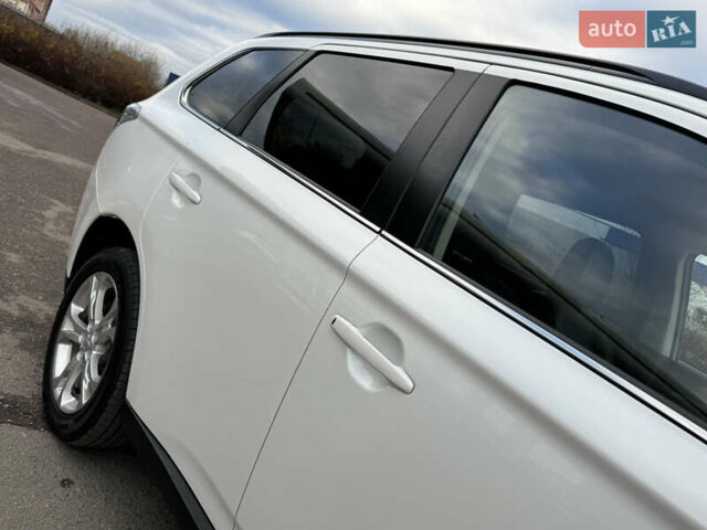 Белый Мицубиси Аутлендер, объемом двигателя 2.3 л и пробегом 214 тыс. км за 15499 $, фото 19 на Automoto.ua