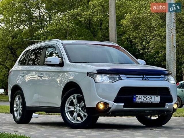 Белый Мицубиси Аутлендер, объемом двигателя 2.4 л и пробегом 140 тыс. км за 12900 $, фото 16 на Automoto.ua