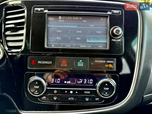 Белый Мицубиси Аутлендер, объемом двигателя 2.4 л и пробегом 140 тыс. км за 12900 $, фото 75 на Automoto.ua