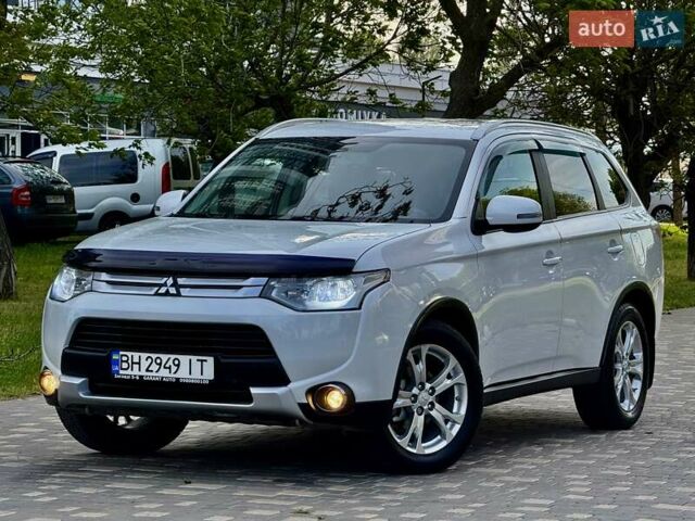 Белый Мицубиси Аутлендер, объемом двигателя 2.4 л и пробегом 140 тыс. км за 12900 $, фото 43 на Automoto.ua