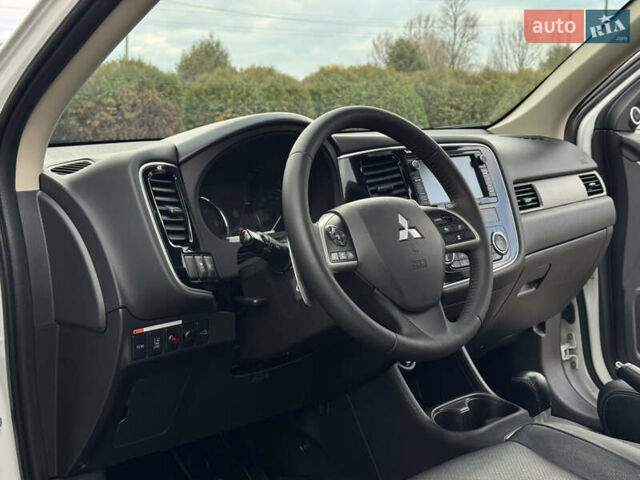 Белый Мицубиси Аутлендер, объемом двигателя 2.3 л и пробегом 214 тыс. км за 15499 $, фото 88 на Automoto.ua