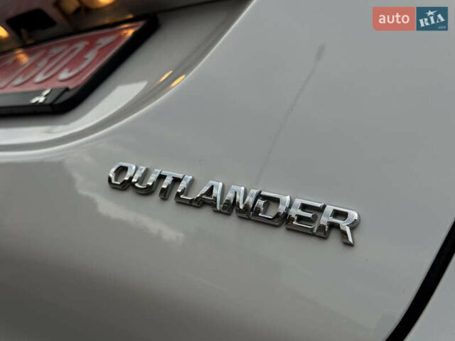 Белый Мицубиси Аутлендер, объемом двигателя 2.3 л и пробегом 214 тыс. км за 15499 $, фото 56 на Automoto.ua