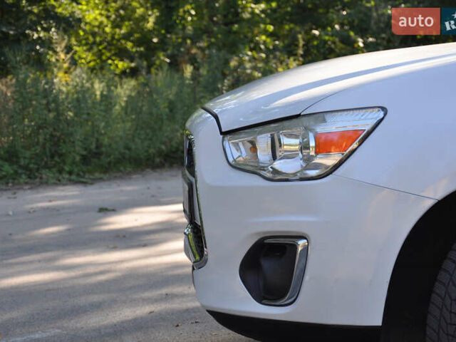 Белый Мицубиси Аутлендер, объемом двигателя 2 л и пробегом 132 тыс. км за 11500 $, фото 12 на Automoto.ua