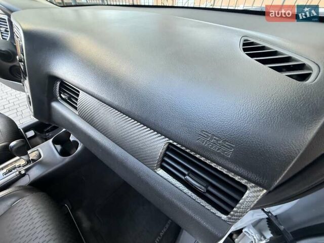 Белый Мицубиси Аутлендер, объемом двигателя 2.36 л и пробегом 140 тыс. км за 12999 $, фото 42 на Automoto.ua