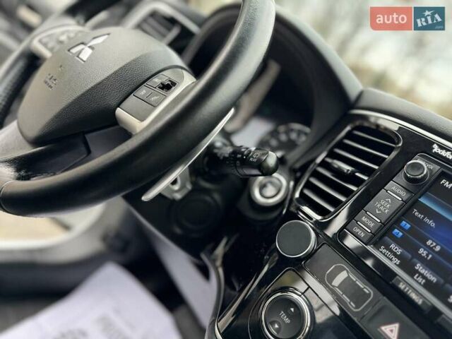 Белый Мицубиси Аутлендер, объемом двигателя 2 л и пробегом 210 тыс. км за 14300 $, фото 50 на Automoto.ua