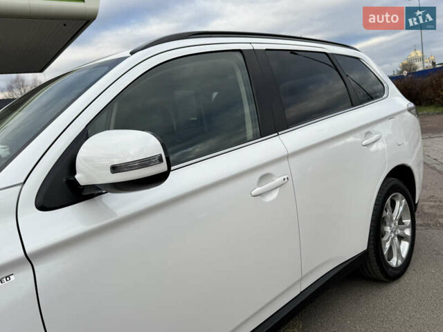 Белый Мицубиси Аутлендер, объемом двигателя 2.3 л и пробегом 214 тыс. км за 15499 $, фото 41 на Automoto.ua