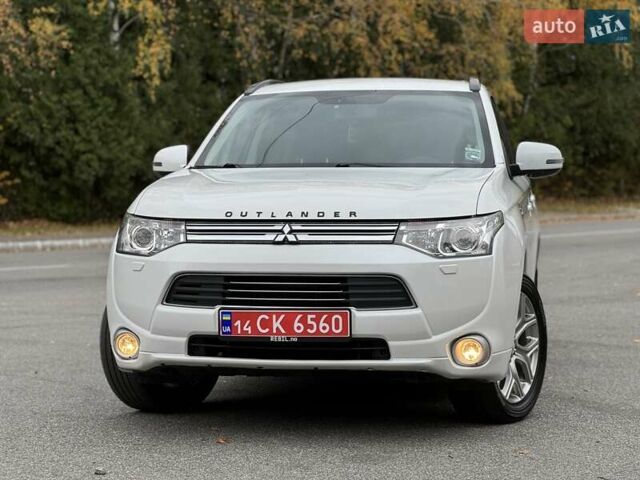 Белый Мицубиси Аутлендер, объемом двигателя 2 л и пробегом 210 тыс. км за 14300 $, фото 10 на Automoto.ua