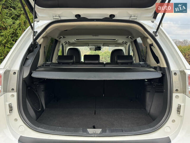 Белый Мицубиси Аутлендер, объемом двигателя 2.3 л и пробегом 214 тыс. км за 15499 $, фото 144 на Automoto.ua