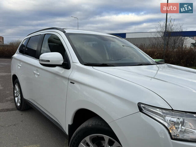 Белый Мицубиси Аутлендер, объемом двигателя 2.3 л и пробегом 214 тыс. км за 15499 $, фото 13 на Automoto.ua