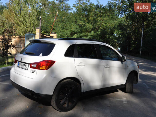 Белый Мицубиси Аутлендер, объемом двигателя 2 л и пробегом 132 тыс. км за 11500 $, фото 4 на Automoto.ua