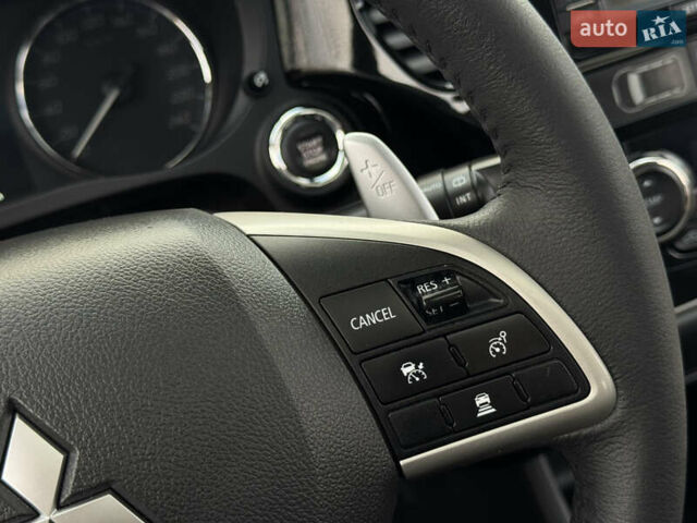 Белый Мицубиси Аутлендер, объемом двигателя 2.3 л и пробегом 214 тыс. км за 15499 $, фото 93 на Automoto.ua