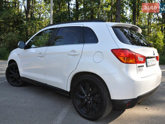 Белый Мицубиси Аутлендер, объемом двигателя 2 л и пробегом 132 тыс. км за 11500 $, фото 9 на Automoto.ua