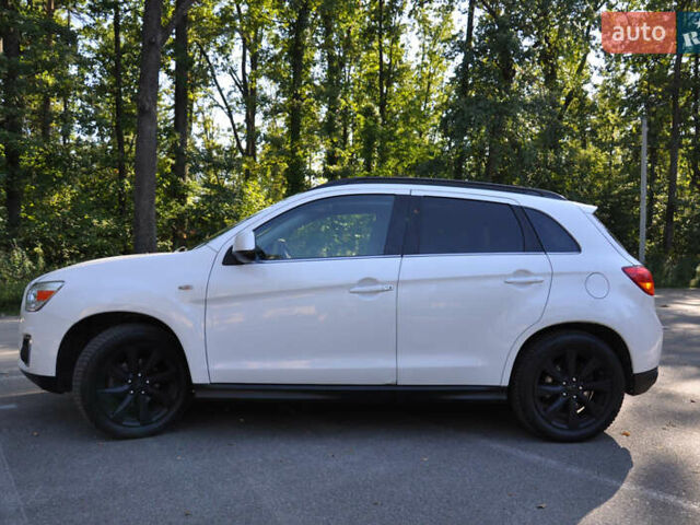 Белый Мицубиси Аутлендер, объемом двигателя 2 л и пробегом 132 тыс. км за 11500 $, фото 10 на Automoto.ua