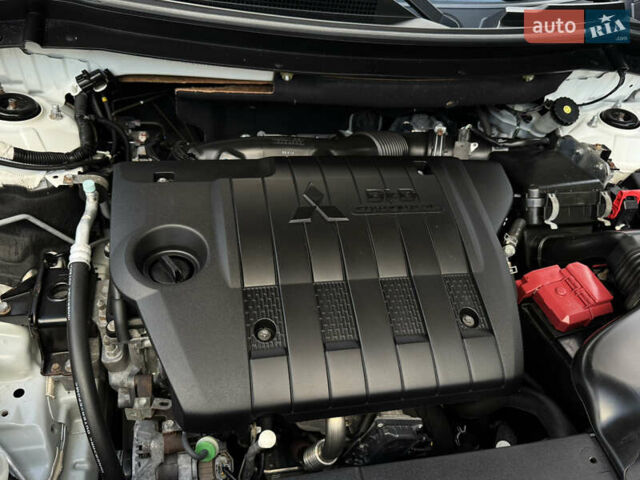 Белый Мицубиси Аутлендер, объемом двигателя 2.3 л и пробегом 214 тыс. км за 15499 $, фото 150 на Automoto.ua