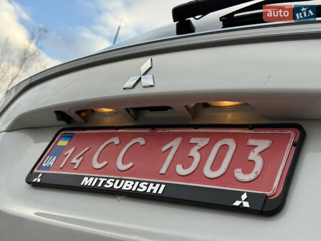Белый Мицубиси Аутлендер, объемом двигателя 2.3 л и пробегом 214 тыс. км за 15499 $, фото 52 на Automoto.ua