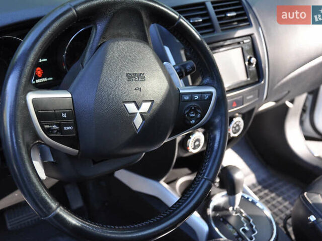 Белый Мицубиси Аутлендер, объемом двигателя 2 л и пробегом 132 тыс. км за 11500 $, фото 16 на Automoto.ua