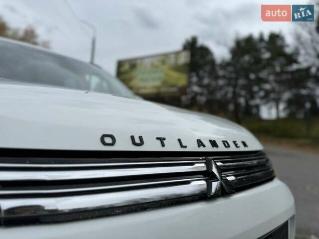 Белый Мицубиси Аутлендер, объемом двигателя 2 л и пробегом 210 тыс. км за 14300 $, фото 7 на Automoto.ua