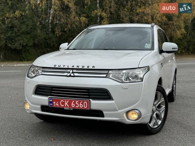 Белый Мицубиси Аутлендер, объемом двигателя 2 л и пробегом 210 тыс. км за 14300 $, фото 13 на Automoto.ua