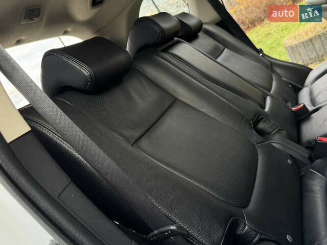 Белый Мицубиси Аутлендер, объемом двигателя 2.3 л и пробегом 214 тыс. км за 15499 $, фото 140 на Automoto.ua