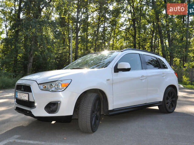 Белый Мицубиси Аутлендер, объемом двигателя 2 л и пробегом 132 тыс. км за 11500 $, фото 11 на Automoto.ua