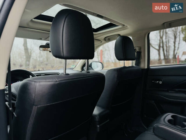 Белый Мицубиси Аутлендер, объемом двигателя 2.2 л и пробегом 140 тыс. км за 16200 $, фото 78 на Automoto.ua