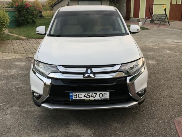 Білий Міцубісі Аутлендер, об'ємом двигуна 2.4 л та пробігом 173 тис. км за 13700 $, фото 14 на Automoto.ua