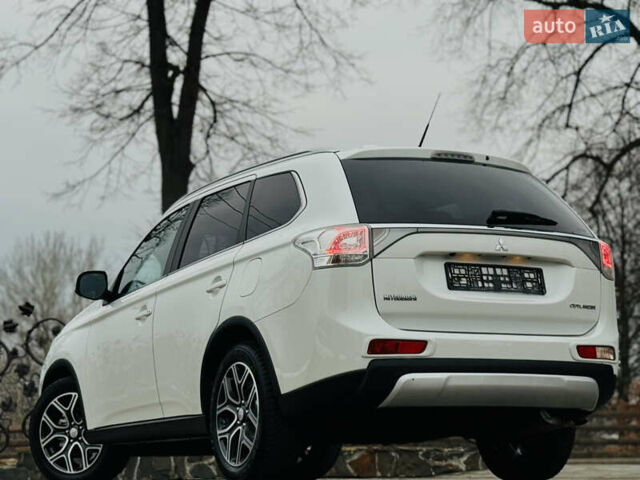 Белый Мицубиси Аутлендер, объемом двигателя 2.2 л и пробегом 140 тыс. км за 16200 $, фото 19 на Automoto.ua
