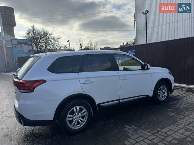Белый Мицубиси Аутлендер, объемом двигателя 2.4 л и пробегом 91 тыс. км за 14900 $, фото 17 на Automoto.ua