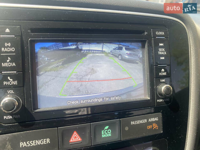 Білий Міцубісі Аутлендер, об'ємом двигуна 2.36 л та пробігом 159 тис. км за 15500 $, фото 15 на Automoto.ua