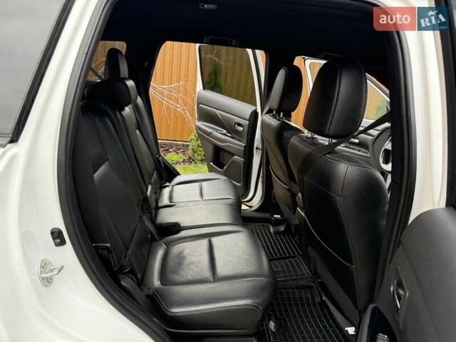 Белый Мицубиси Аутлендер, объемом двигателя 2.36 л и пробегом 191 тыс. км за 13950 $, фото 19 на Automoto.ua