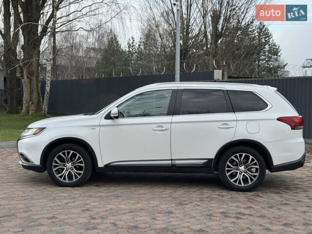 Белый Мицубиси Аутлендер, объемом двигателя 3 л и пробегом 310 тыс. км за 12700 $, фото 39 на Automoto.ua