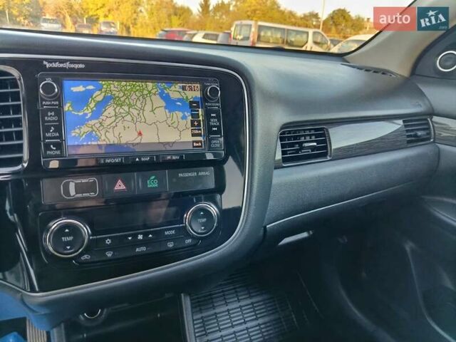 Белый Мицубиси Аутлендер, объемом двигателя 2.2 л и пробегом 225 тыс. км за 16350 $, фото 33 на Automoto.ua