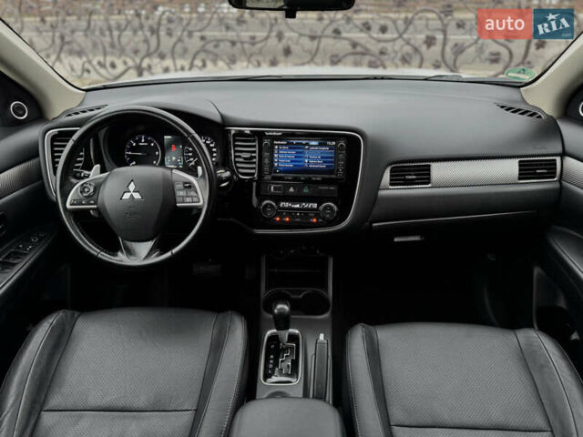 Белый Мицубиси Аутлендер, объемом двигателя 2.2 л и пробегом 140 тыс. км за 16200 $, фото 73 на Automoto.ua
