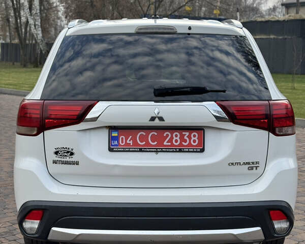 Белый Мицубиси Аутлендер, объемом двигателя 3 л и пробегом 310 тыс. км за 12700 $, фото 32 на Automoto.ua